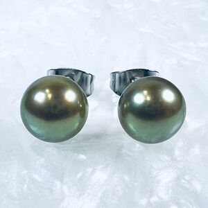 Beautiful metallic green pierced post costume earrings